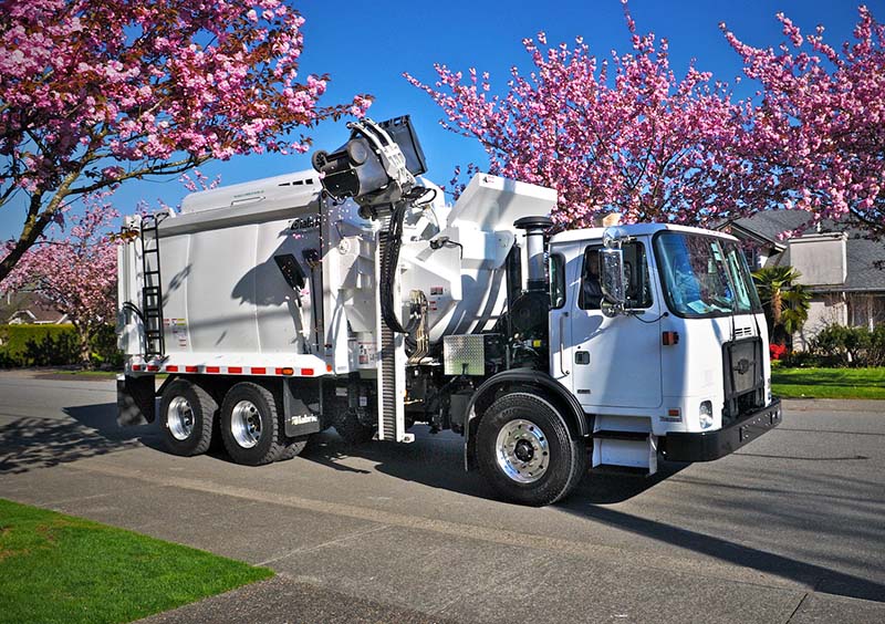 Everything You Need to Know About the McNeilus Zero Radius Side Loader Garbage Truck